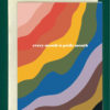 Close-up of a greeting card on top of a cream-colored envelope, all on a forest background. The greeting card is rainbow-colored, and reads, "every month is pride month"