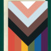 Close-up of a Progress Pride Flag greeting card on top of a cream-colored envelope, all on a forest background.