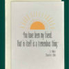 Close-up product shot of a greeting card that features a drawing of a yellow sun above text. Text reads, "'You have been my friend. That in itself is a tremendous thing.' - E.B. White, Charlotte's Web"